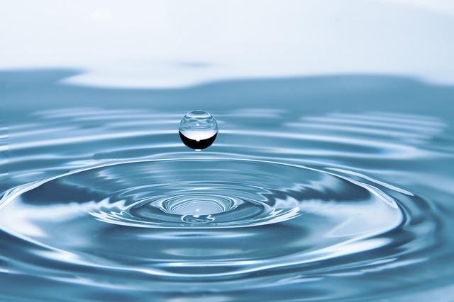 water drop falling in water, water for spiritual purification, jewish hand washing