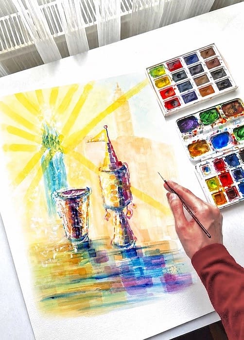 artist hand painting a watercolor of havdalah Jewish ritual, modern jewish art